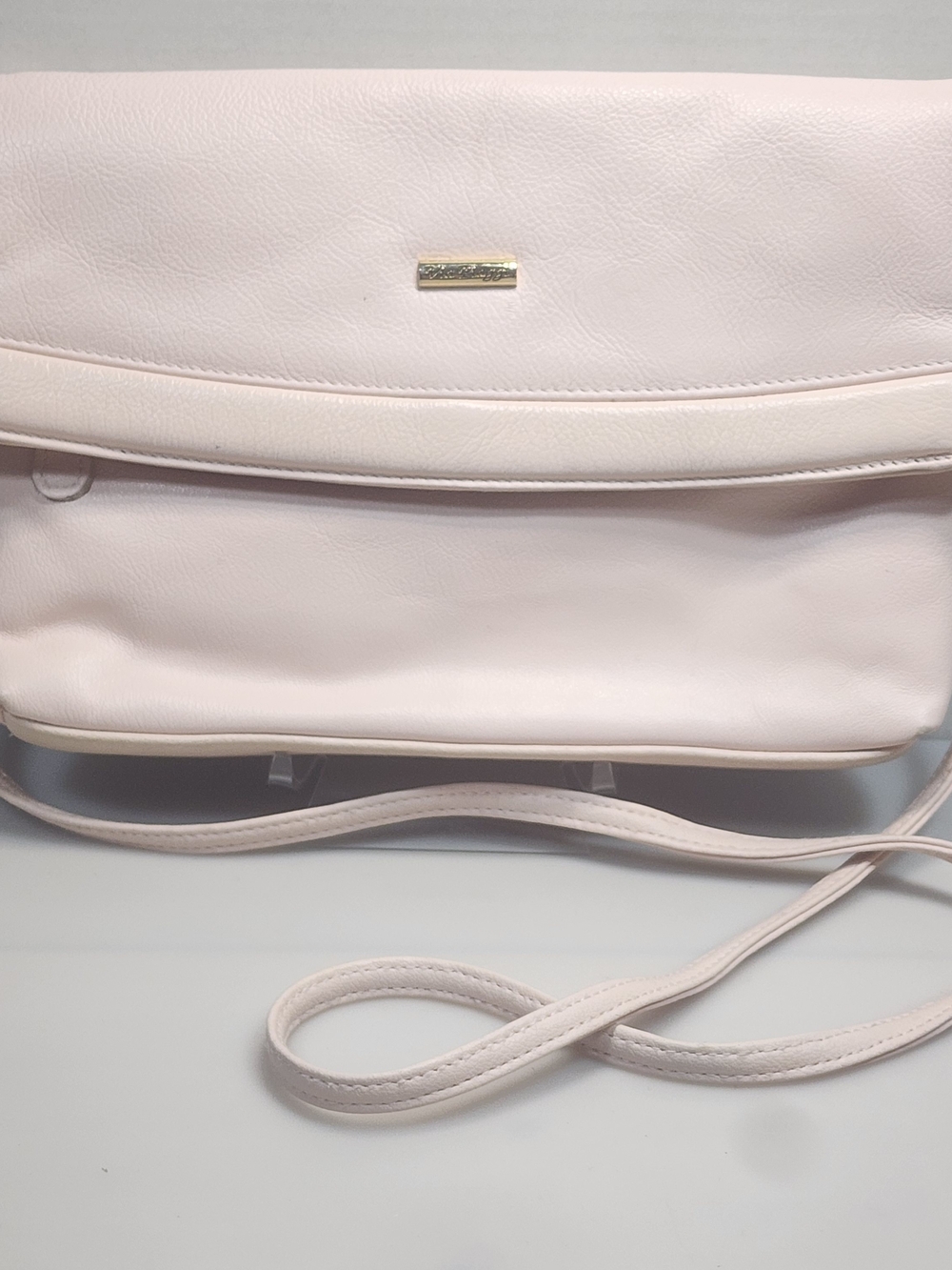 Elegant Pale Blush Pink Crossbody Bag with Gold Accent